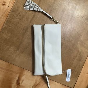 Ivory handbag with tags